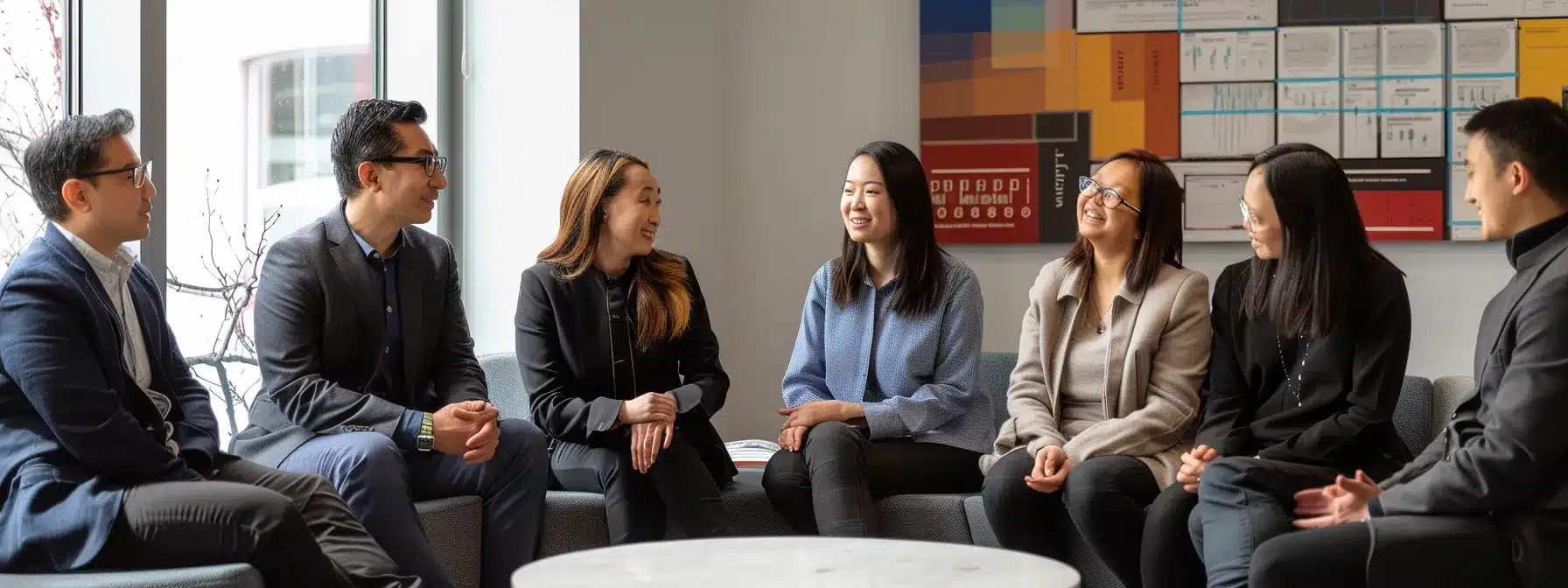 a group of diverse employees engaged in a feedback session, surrounded by charts measuring the impact of cultural change in a modern office setting.