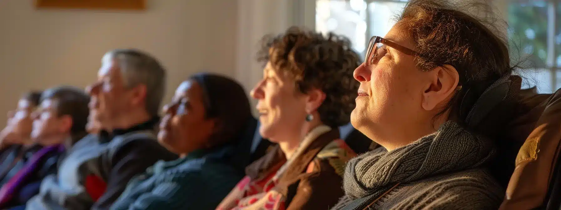 a diverse group of individuals with disabilities participating in a faith-based community outreach program, supported by compassionate business representatives.